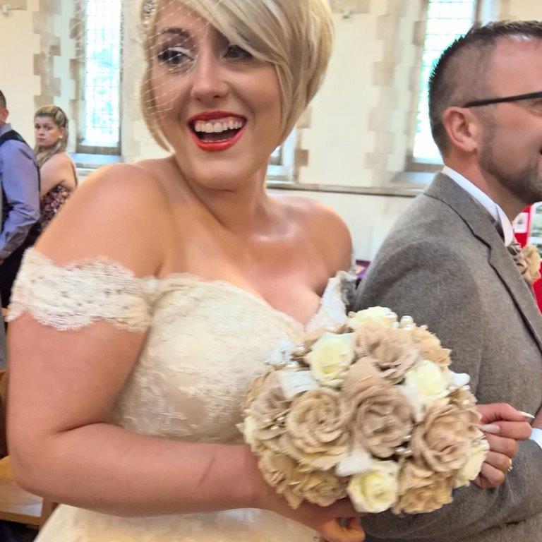 Bride with hessian roses